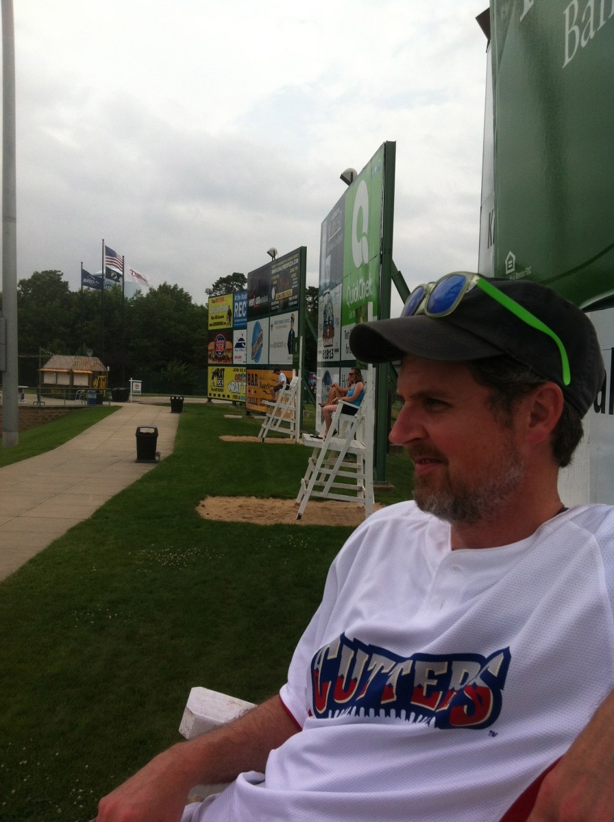 Jason relaxes in a lifeguard chair before the game.